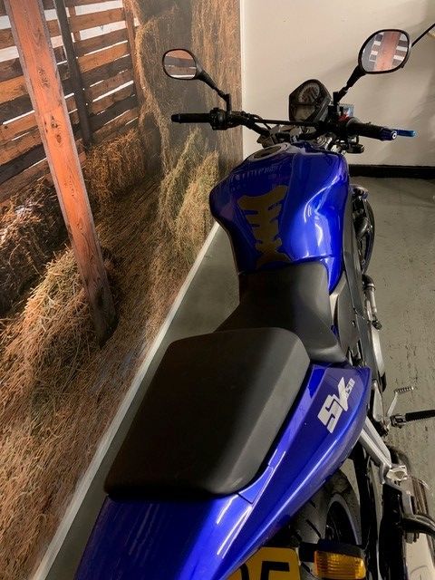 blue motorcycle top view focus on back sit